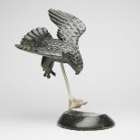 CHARLIE UGYUK (1931-1999), SPENCE BAY / TALOYOAK FLYING FALCON SWOOPING TOWARD PREY stone, antler,