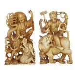 A PAIR OF IVORY DAOIST DEITIES, 19TH/20TH CENTURY 十九/二十世紀初 牙雕 降龍伏虎羅漢 Each delicately carved in a