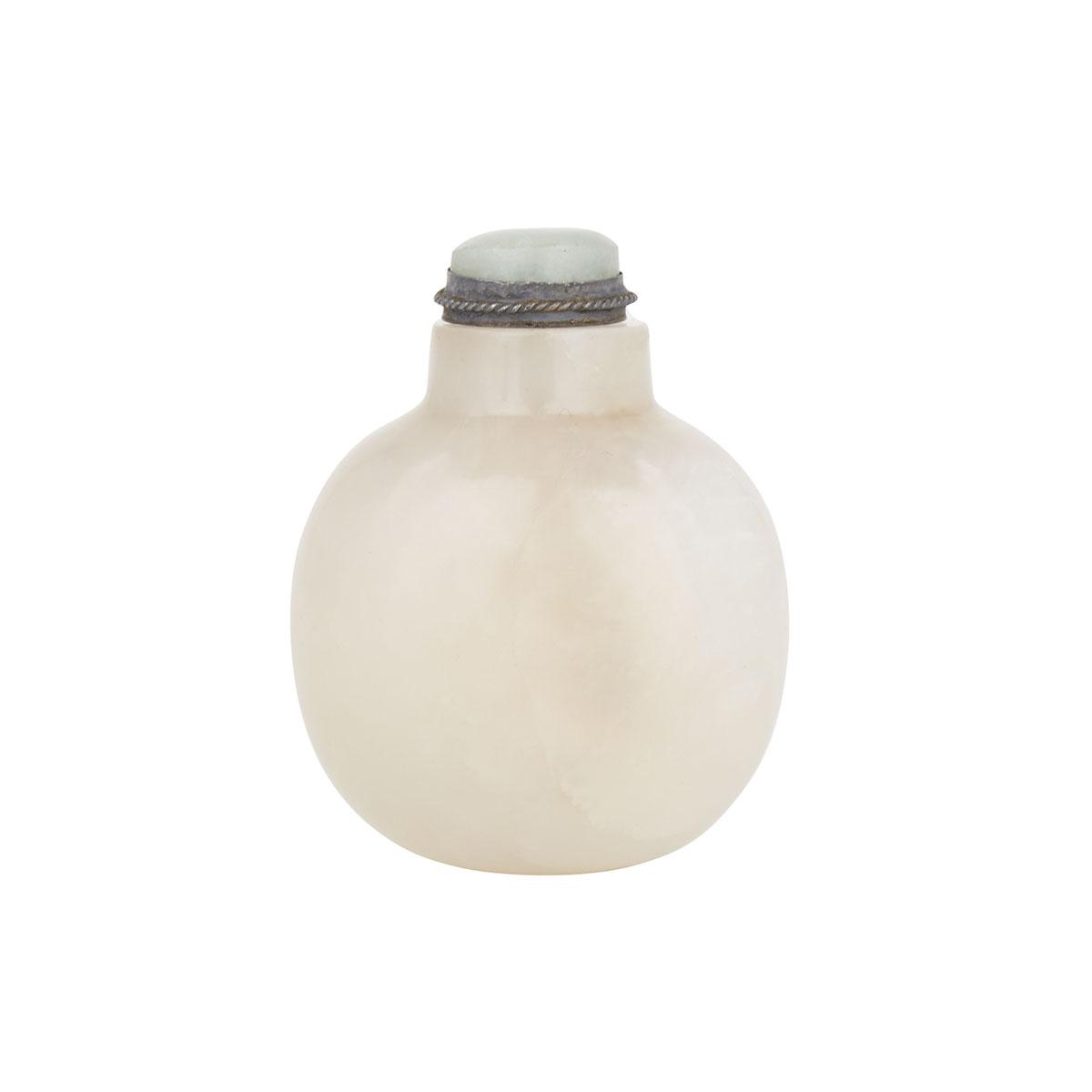 A WHITE JADE SNUFF BOTTLE, 19TH CENTURY 清十九世紀 白玉鼻煙壺 The bottle carved in a smooth, rounded form, the