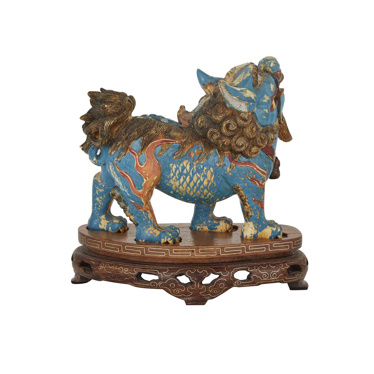 A CARVED POLYCHROMED IVORY QILIN, 19TH CENTURY 清十九世紀 牙雕加彩麒麟 The beast finely carved, standing - Image 2 of 2