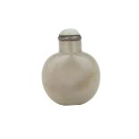 A GREY JADE SNUFF BOTTLE, 19TH CENTURY 清十九世紀 灰玉鼻煙壺 Of flattened, rounded form, the softly polished