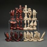 ITALIAN TURNED AND CARVED BONE ‘SEA-LIFE’ CHESS SET, EARLY 20TH CENTURYon side stained red, the