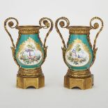 PAIR OF ORMOLU MOUNTED ‘SÈVRES’ GREEN GROUND VASES, LATE 19TH CENTURYpainted in colours with