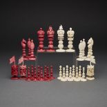 CHINESE EXPORT ‘BURMESE PATTERN’ TURNED AND CARVED IVORY CHESS SET, CANTON, C.1820one side stained