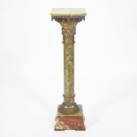 FRENCH CHAMPLEVÉ ENAMELLED GILT BRONZE MOUNTED ONYX COLUMN FORM PEDESTAL, 19TH CENTURYon red