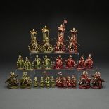 INDIAN CARVED, POLYCHROMED AND PARCEL GILT BONE FIGURAL CHESS SET, RAJASTHAN, LATE 19TH/EARLY 20TH