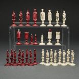 DIEPPE CARVED AND POLISHED BONE FIGURAL CHESS SET, EARLY 19TH CENTURYone side stained red, the