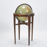 REPLOGLE ILLUMINATED LIBRARY FLOOR GLOBE, C.1942on fully articulated walnut streamline design