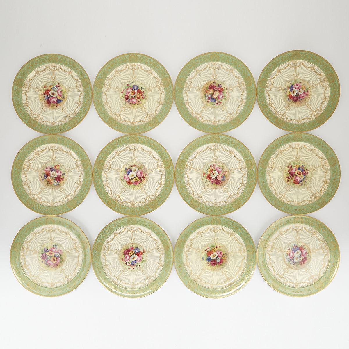 TWELVE ROYAL WORCESTER SERVICE PLATES, HORACE H. PRICE, 1930with apple green, cream and gilt