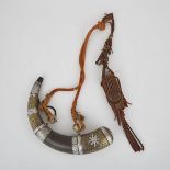 MOROCCAN SILVER AND BRASS MOUNTED POWDER HORN, 19TH CENTURYwith braided cord and leather shot