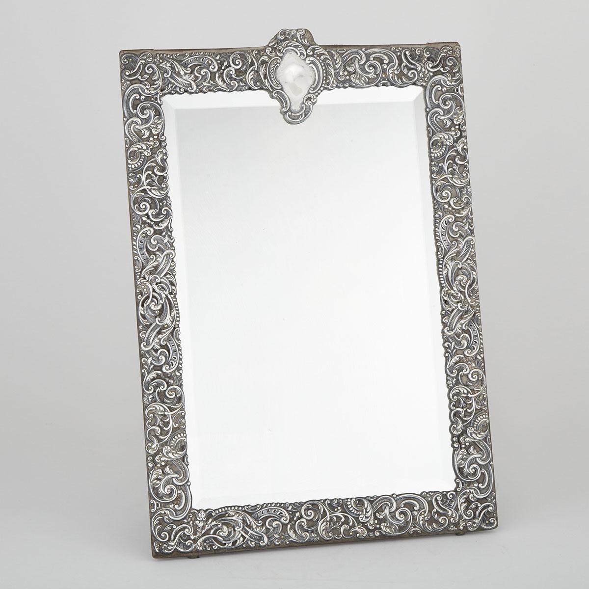 LATE VICTORIAN SILVER FRAMED WALL MIRROR, GOLDSMITHS & SILVERSMITHS CO., LONDON, 1900with