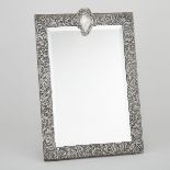 LATE VICTORIAN SILVER FRAMED WALL MIRROR, GOLDSMITHS & SILVERSMITHS CO., LONDON, 1900with
