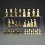 CONTINENTAL CARVED, POLYCHROMED AND PARCEL GILT BONE NAVAL BUST FORM CHESS SET, LATE 18TH/EARLY 19TH