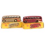 2 Dinky Toys Luxury Coach (281). In maroon with cream flash and maroon wheels. Plus another in