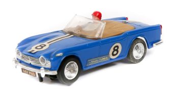 A 1960’s Scalextric ‘Race Tuned’ series Triumph TR4A. An example in blue with tan tonneau, RN8,