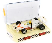 A scarce 1970’s French Scalextric Yardley McLaren M23      (C121). In white with orange flashes,