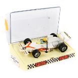 A scarce 1970’s French Scalextric Yardley McLaren M23      (C121). In white with orange flashes,