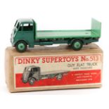 Dinky Supertoys Guy Flat Truck-with tailboard (513). An example with cab and chassis in dark green