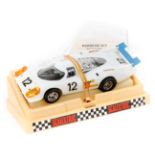 A scarce 1970’s French Scalextric Porsche 917 (090022). In white with black interior, RN12. In cream