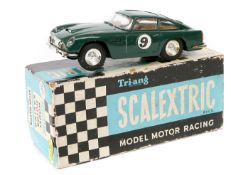 A scarce 1960’s Scalextric Aston Martin DB5 (MM/C.57). In British Racing Green with light brown