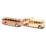 2 Dinky Toys Coaches. An Observation Coach (29f) in cream with red flash and cream wheels. Plus a