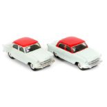 2 Corgi Toys Standard Vanguard 111 (207). In pale green with red roof and sides, smooth spun wheels.