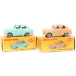 2 Dinky Toys Austin A30 Saloon (160). One in turquoise with smooth light grey plastic wheels. The