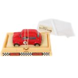 A scarce 1970’s French Scalextric Austin-Morris Mini racing car (090007). In bright red with black