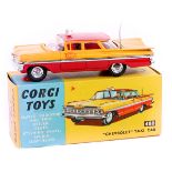 Corgi Toys Chevrolet Impala Taxi cab (480). An example in yellow and red with silver plastic flash