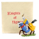 A Britains ‘Knights of Agincourt’ No9493 Mounted knight with sword. Gold crested helmet, blue over