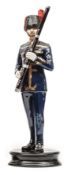 A similar figure of a bandsman “Royal Artillery”, in full dress with bassoon, “Model no 44”,