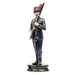 A similar figure of a bandsman “Royal Artillery”, in full dress with bassoon, “Model no 44”,