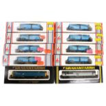 A quantity of ‘N’ gauge Locomotives and freight wagons. 2 Graham Farish diesel locomotives. A BR