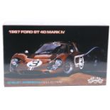 A GMP 1:12 scale 1967 Ford GT 40 Mark 1V. A finely detailed model finished in metallic bronze with