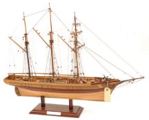 “Rhoda Mary”, a 3 masted schooner of 1898, on wooden stand, 29” long x 23” high including stand. GC