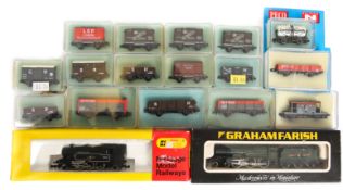 A quantity of ‘N’ gauge Locomotives and freight wagons. A Minitrix BR 2-6-2 tank locomotive RN 41234
