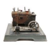 A Marklin Stationary Steam Plant. The major parts, boiler with brass bands, whistle, safety valve,