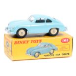 A Dinky Toys Porsche 356A Coupe (182). An example in light blue with cream wheels. Boxed, minor