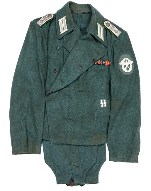 An SS Police Panzer officer’s uniform, comprising special pattern green cross-over jacket. Machine