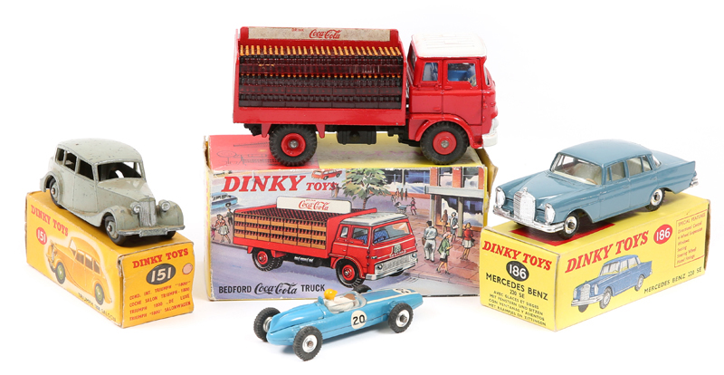 7 Dinky Toys. A Bedford Coca-Cola Truck (402) in red and white livery, with blue cab interior and