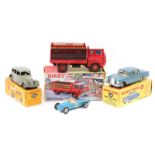 7 Dinky Toys. A Bedford Coca-Cola Truck (402) in red and white livery, with blue cab interior and