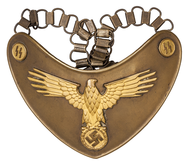 A Third Reich SS Standard Bearer’s gorget, with gilt eagle and discs on brass plate, the reverse