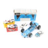 A small quantity of various makes. A Schuco Matra Ford Formula One. An example in light metallic