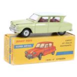 A French Dinky Toys AMI 6 Citroen (557). In light green with pale grey roof and red interior. Boxed,
