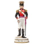 A similar small scale figure “Royal Artillery 1820”, officer in full dress, hand resting on drawn