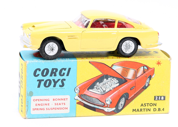 Corgi Toys Aston Martin D.B.4 (218). A scarce example in yellow with bonnet vent, red interior and