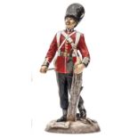 A similar figure of a pioneer “Grenadier Guards”, in full marching order his left hand resting on