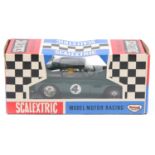 Scalextric Aston Martin DB5. In British Racing Green livery, RN 4. Boxed, some light creasing.