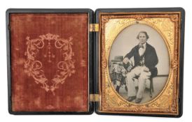 A fine gutta percha “Union” ambrotype case, 5” x 6¼”, embossed with trophy of crossed cannon,
