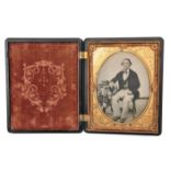 A fine gutta percha “Union” ambrotype case, 5” x 6¼”, embossed with trophy of crossed cannon,